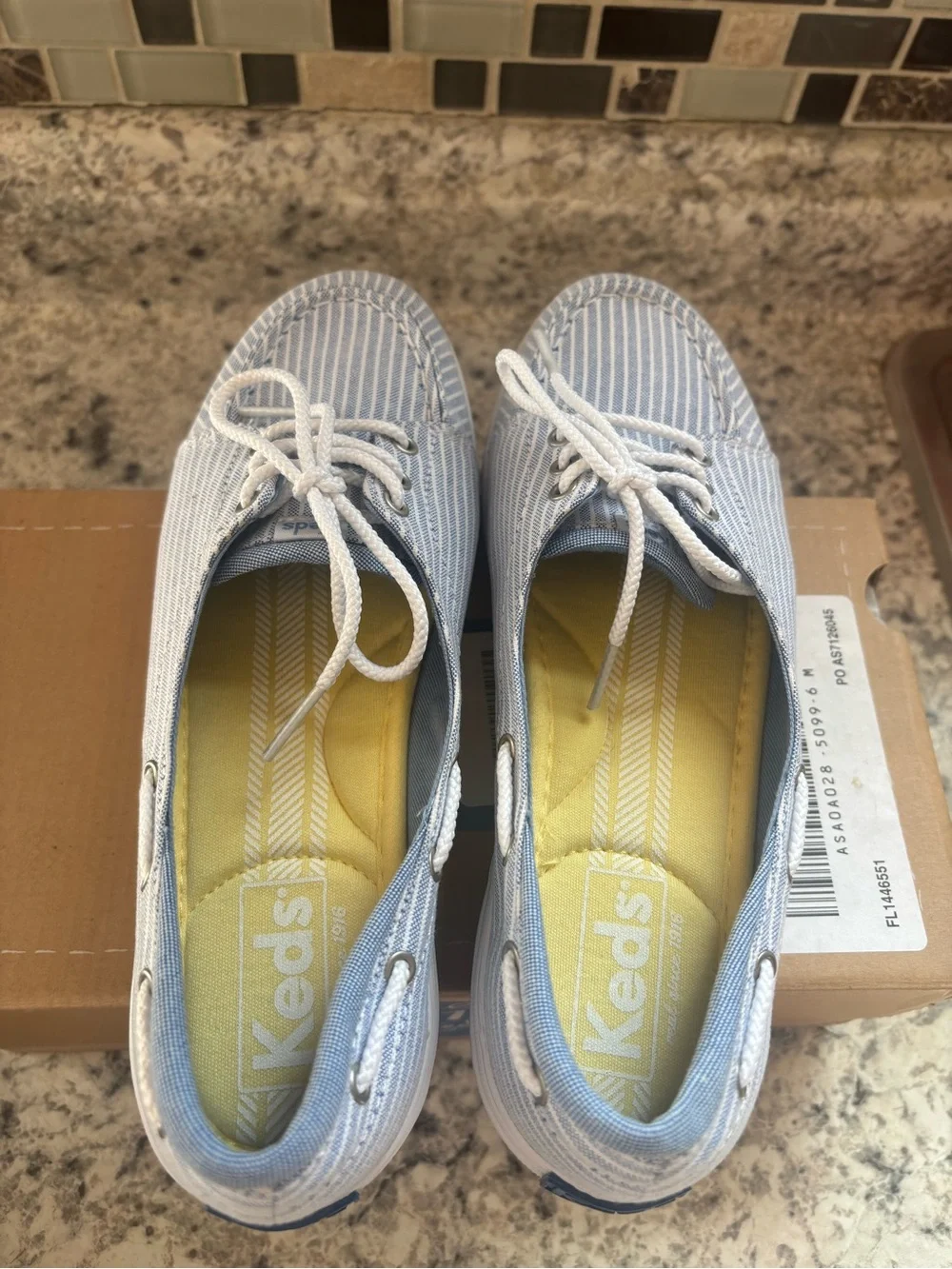 Keds lace up boat style shoe